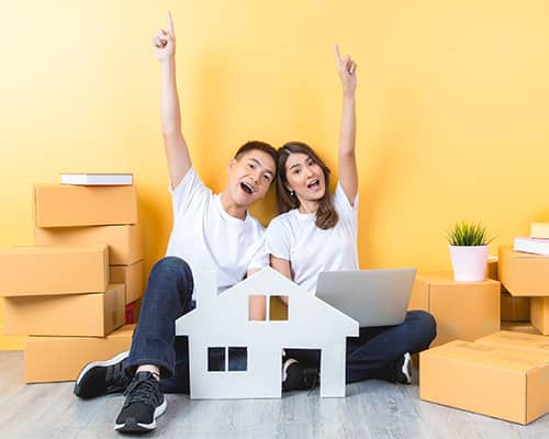 Young couple moving into their new home